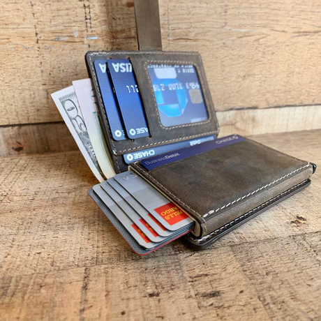 Side-by-side comparison of a regular leather bifold wallet and an RFID blocking travel wallet, showing the difference in card protection for Australian travellers.