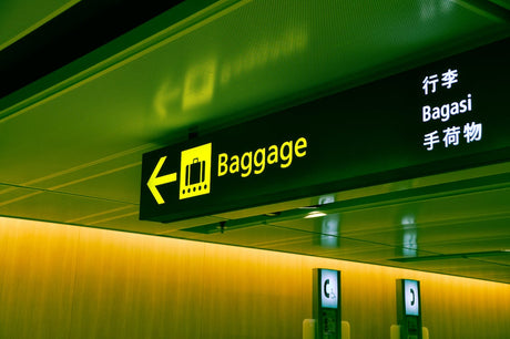 Lightweight hardshell carry-on suitcase on scales showing low weight, suitable for Australian travellers avoiding checked baggage fees.