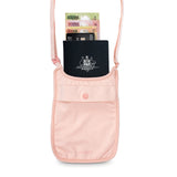 Orchid pink Pacsafe Coversafe S75 packed with passport cash and cards