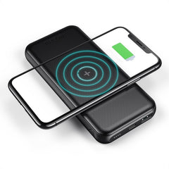Slim wireless power bank charging a phone on a Qi pad