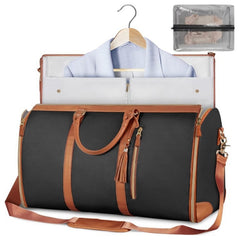 Black convertible garment duffel bag with leather accents, shown holding folded shirts and travel items