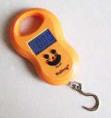 Smiley Portable Luggage Scale 10G to 50KG – Compact, Easy Grip & Precise Display
